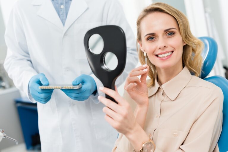 Female patient choosing tooth implant