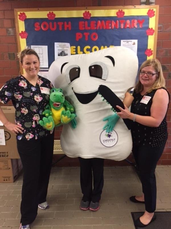 Christine and Amanda visit an elementary school near our Franklin office to teach good brushing and flossing habits to children.