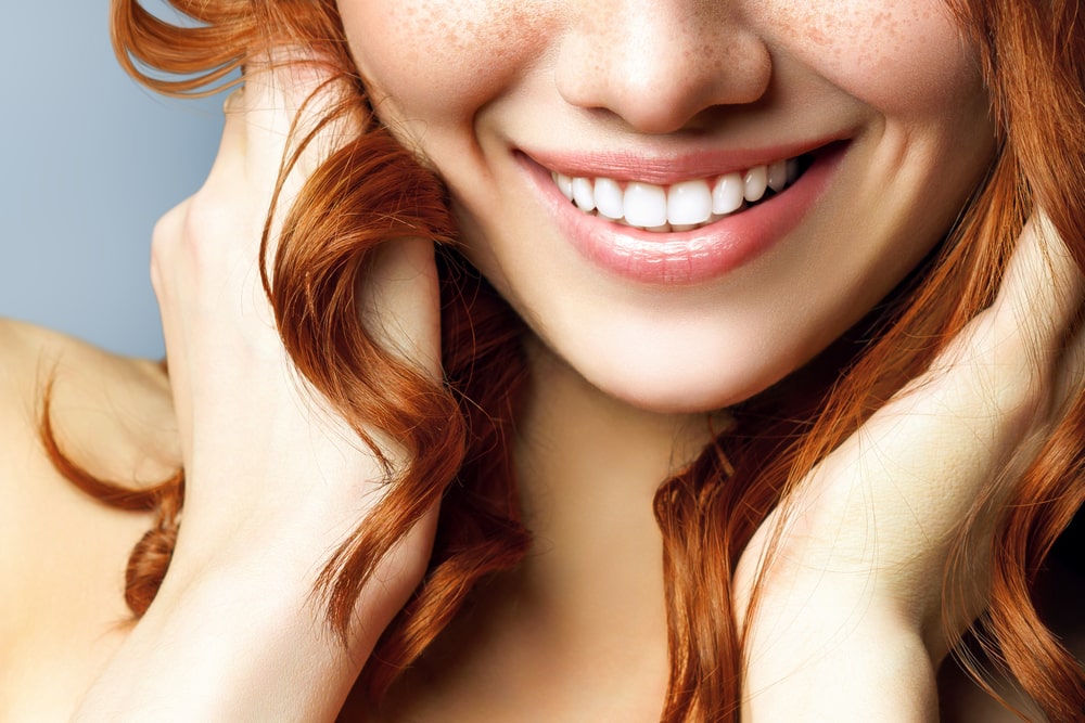 Woman Red Hair Smiling with Teeth